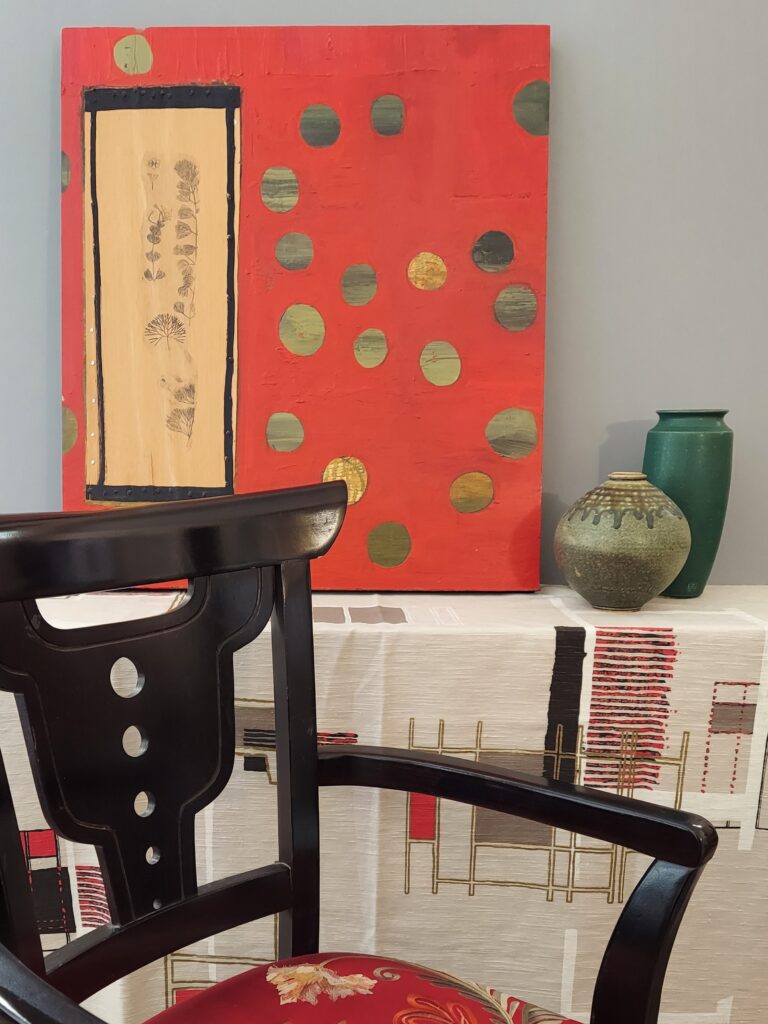 Asian chair with painting and vases